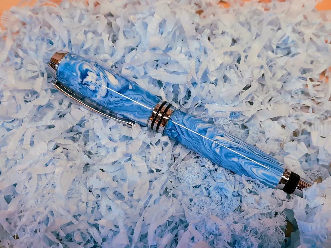 Tycoon Fountain pen, Someone on reddit took a pic of a pen on the shavings, so I stole the idea.... #pen #fountain #silver #blue #penmaking #imakestuff #lathe #fountainpen #crafting