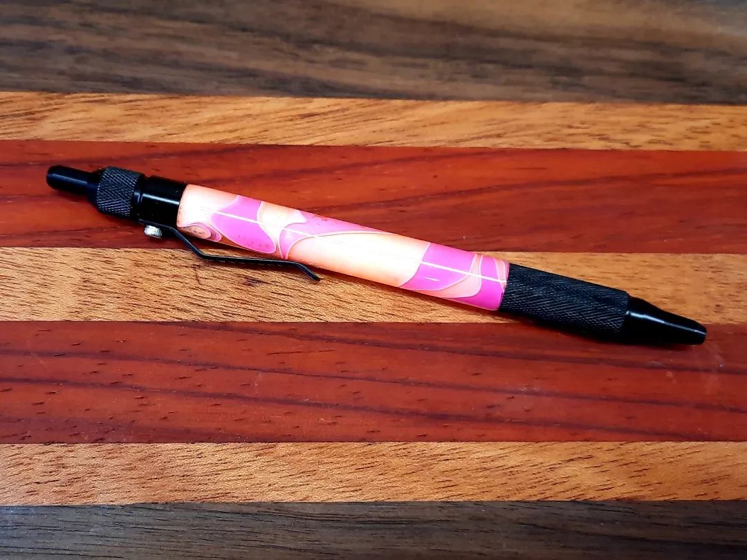 Anvil EDC pen #pen #pink #orange #black #penmaking #crafting #lathe