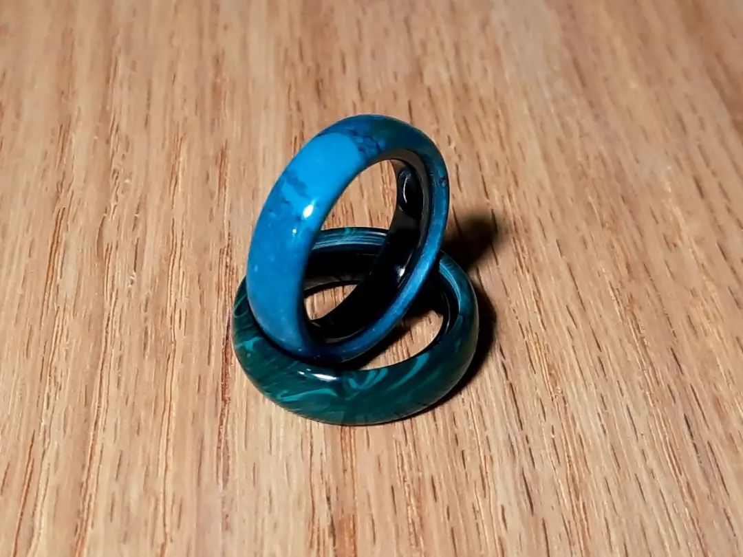 Rings, made from trustone, which looks great but shatters wayyyy too easily :( I might take better pics another time  #ring #jewelry #ringmaking #jewelrymaking #lathe #black #ceramic #green #blue #lathe #makestuff #makeeverything #imadethis