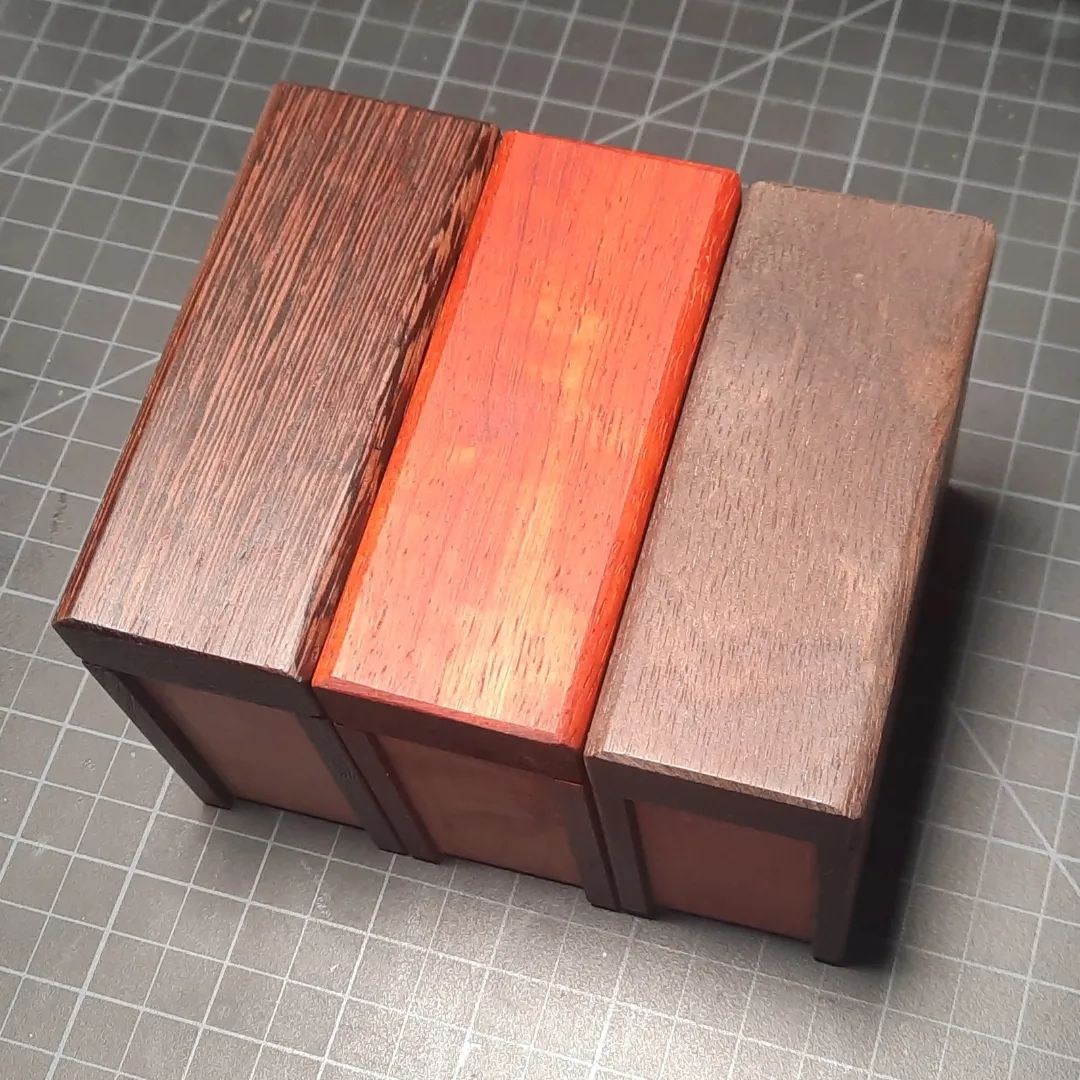 Spellbook dice holders, still working on them, im trying to find some inlay dots to tell what side is up... wenge padauk and paruivian walnut. #spellbook #dice #diceholder #diceholders #book #dnd #polyhedraldice #rpg #roleplayinggame #wenge #padauk #paruvianwalnut #walnut  #maple