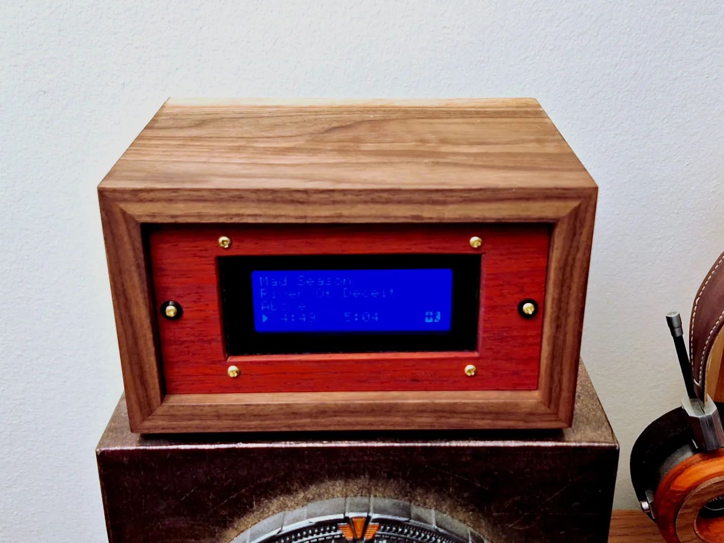 I switched the screws to brass, the two side screws have black washers and  Added some acrylic to the screen, adjusted its brightness, and added some rubber feet. #raspberrypi #walnut #padauk #raudio #brass