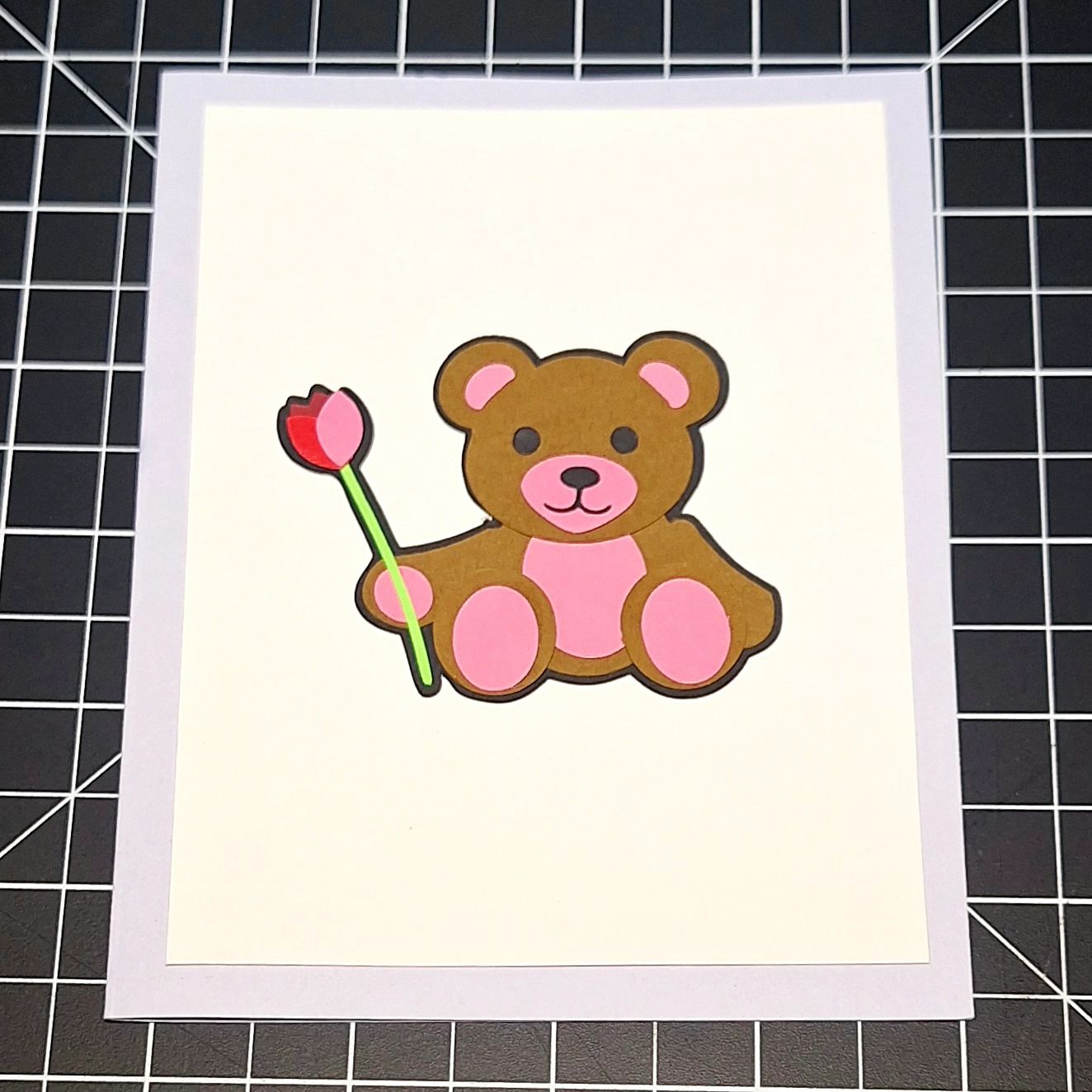 Teddy bear holding a tulip card 5.5x4.25 I had some on purple and a few on blue and 1 with foam #teddy #teddybear #cardmaking #card #tulip #papercrafts #papercraft