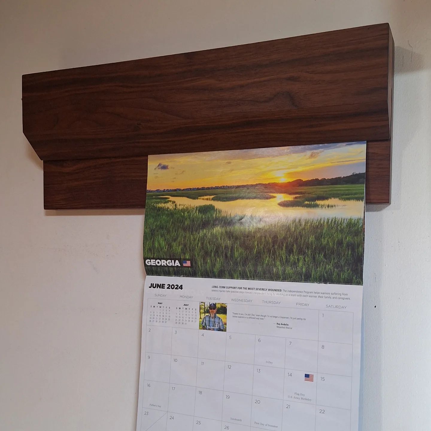 I made this as a prototype. it's much bigger than it needs to be, mostly because I wanted this one to hold a calander and I need a different calander.... its made out of walnut. You can just slide things in and out yet it doesn't just fall out on its own. #display #hanger #wall #art #walnut #ballbearings